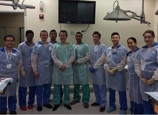 Lorne Rosenfield, MD with residents in operating room.