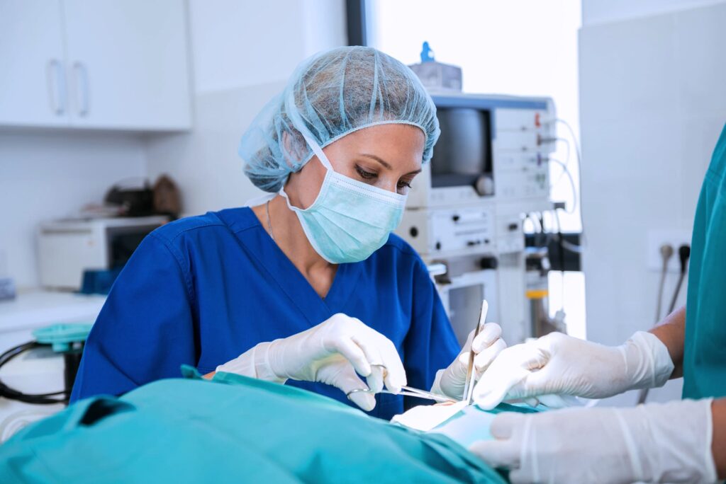 Stock photo - medical doctor performing surgery. 