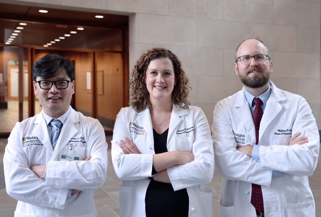 Xiaowei Li, PhD, Amanda M. Westman, PhD and Matthew D. Wood, PhD standing together posed with arms crossed.